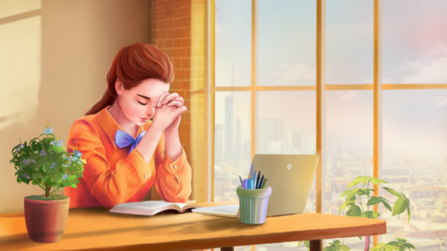 基督徒在桌子上向神祷告